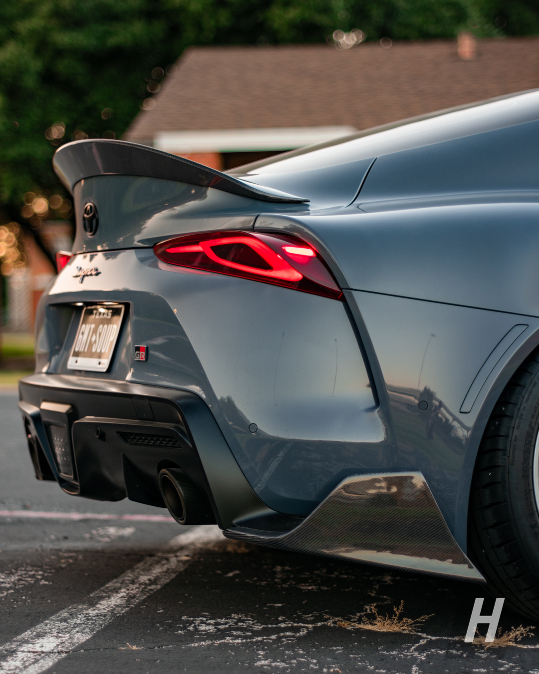 Toyota Supra A90 A91 AG style carbon trunk lip spoiler – installed view 1