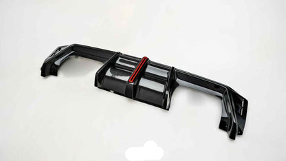 Black car bumper with red accent on a white background